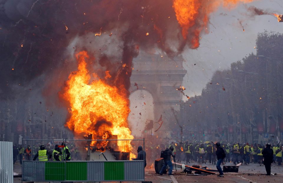  Protesters burned large plywood sheets and other material in the middle of several streets in central Paris, sending up large columns of smoke.