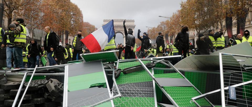  Police tried to push back the protesters, at times beating back demonstrators with baton strikes and dragging them away.