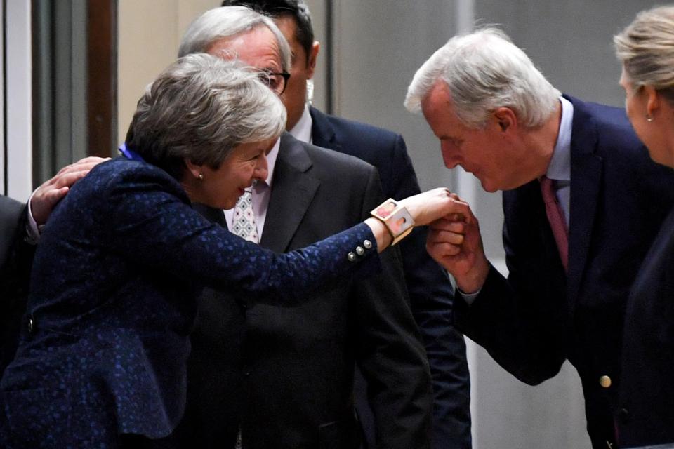  EU negotiator Michel Barnier greets Theresa May in Brussels