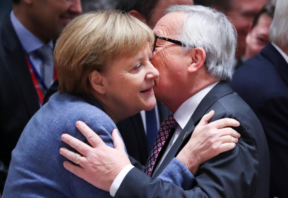  German Chancellor Angela Merkel was there to oversee the historic deal get signed off