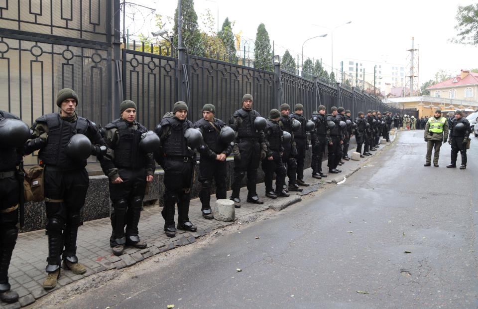  Policemen guard at Russian consulate during a protest action in the Black Sea Ukrainian city of Odessa