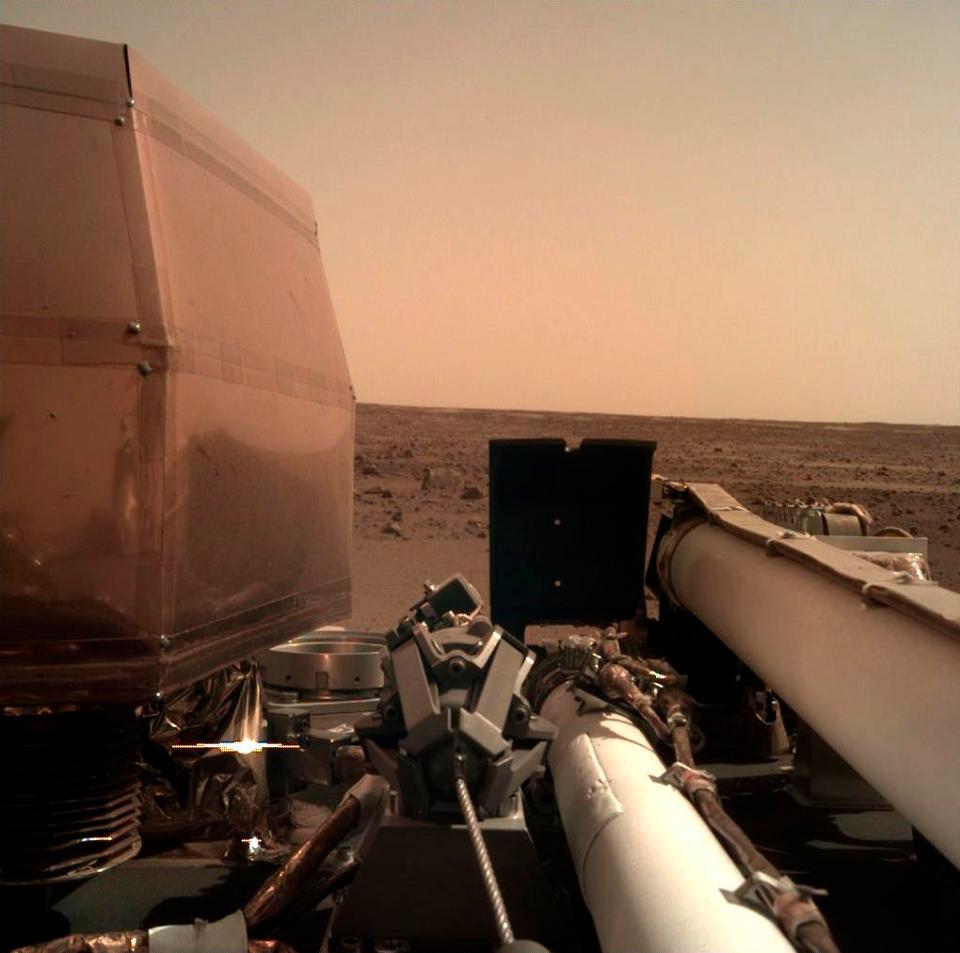  The first photo sent back by Nasa's InSight probe on Mars