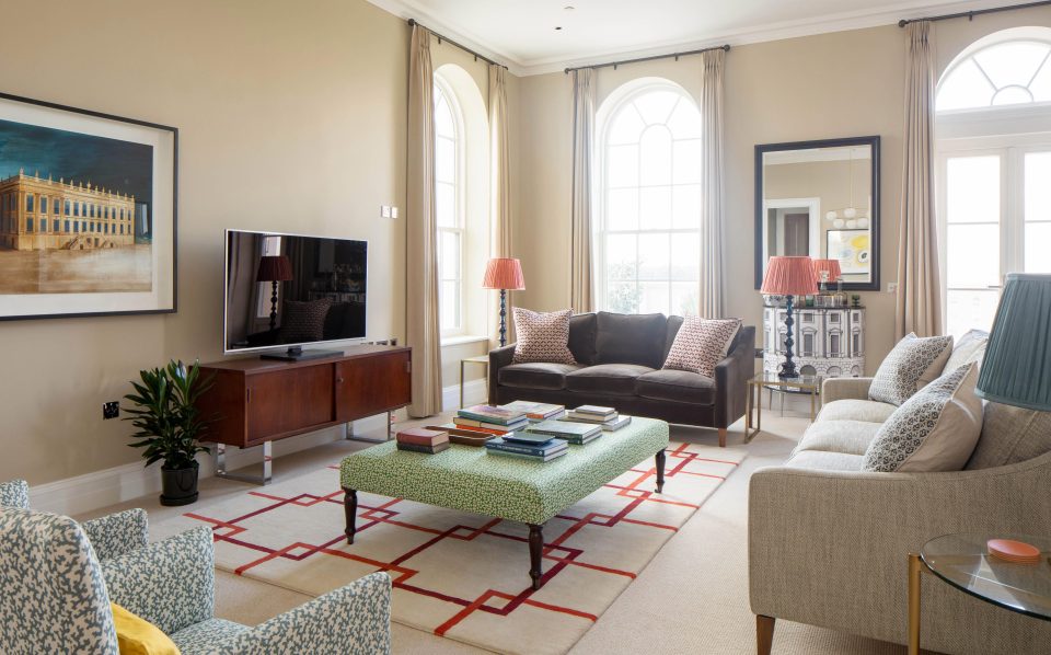  Spacious living areas are brightened with large windows and grand high ceilings