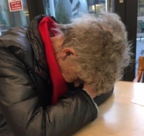  Olive Keers, 82, sits slumped in pain over a table during an all-day wait in A&E amid fears she suffered a heart attack