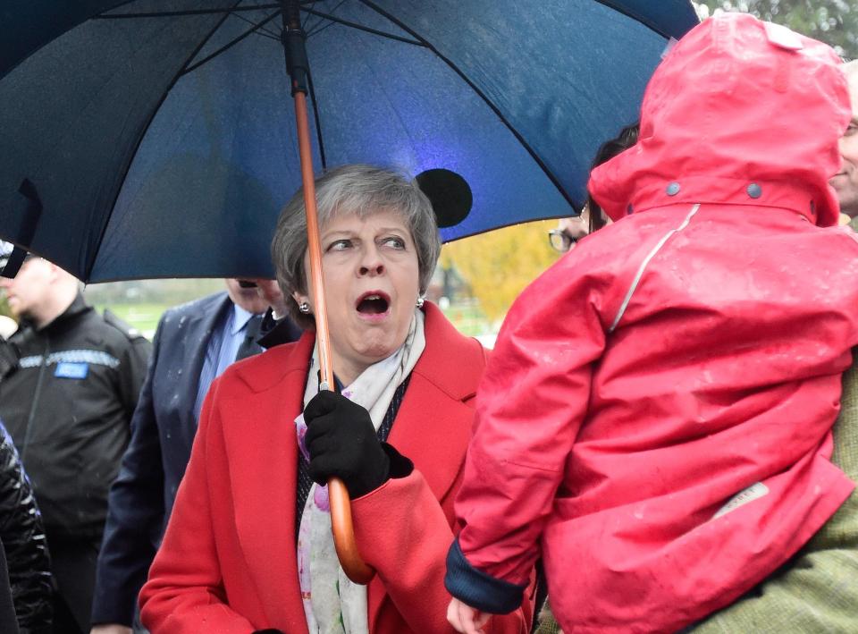  The PM chatting with a child earlier today as the weather took its toll