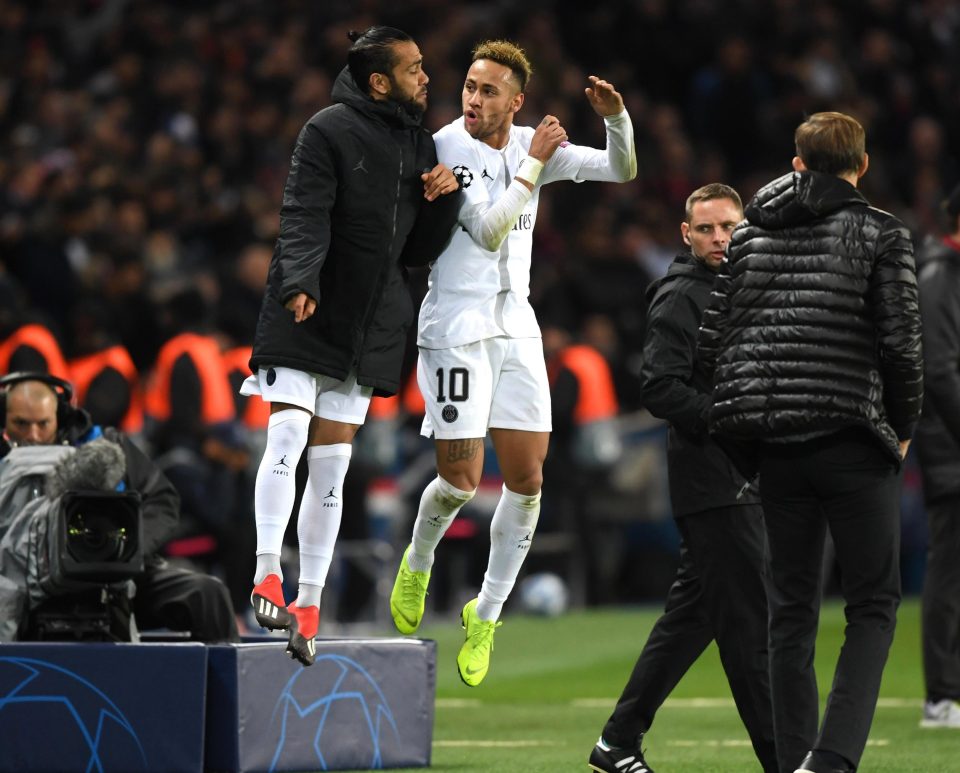  Neymar celebrates what turned out to be the winning goal with sub Dani Alves