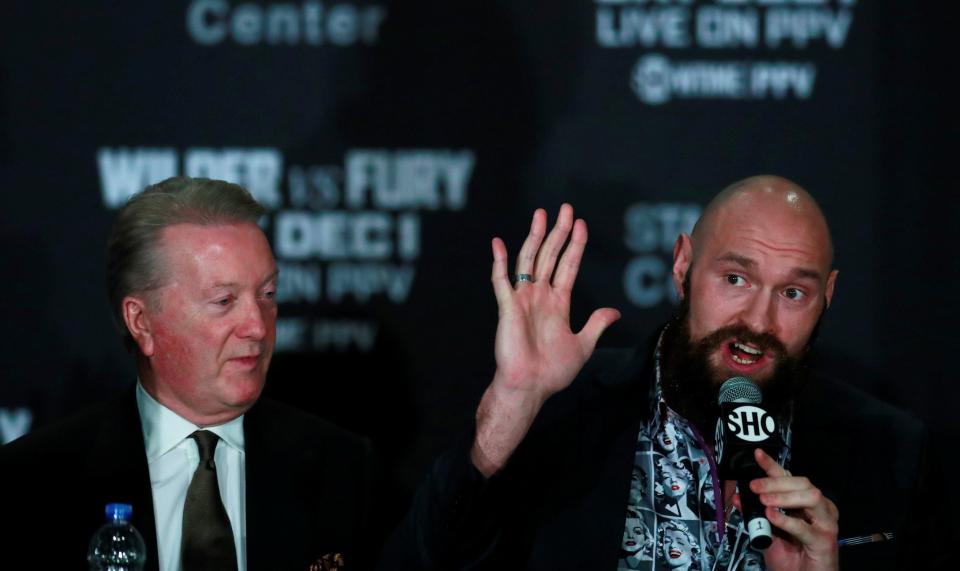  Tyson Fury was alongside Frank Warren on Wednesday evening