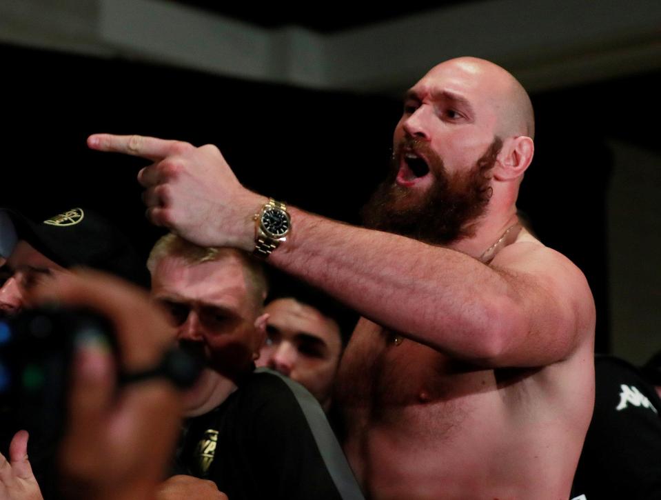  Tyson Fury ripped off his shirt during the pre-fight showdown with the American