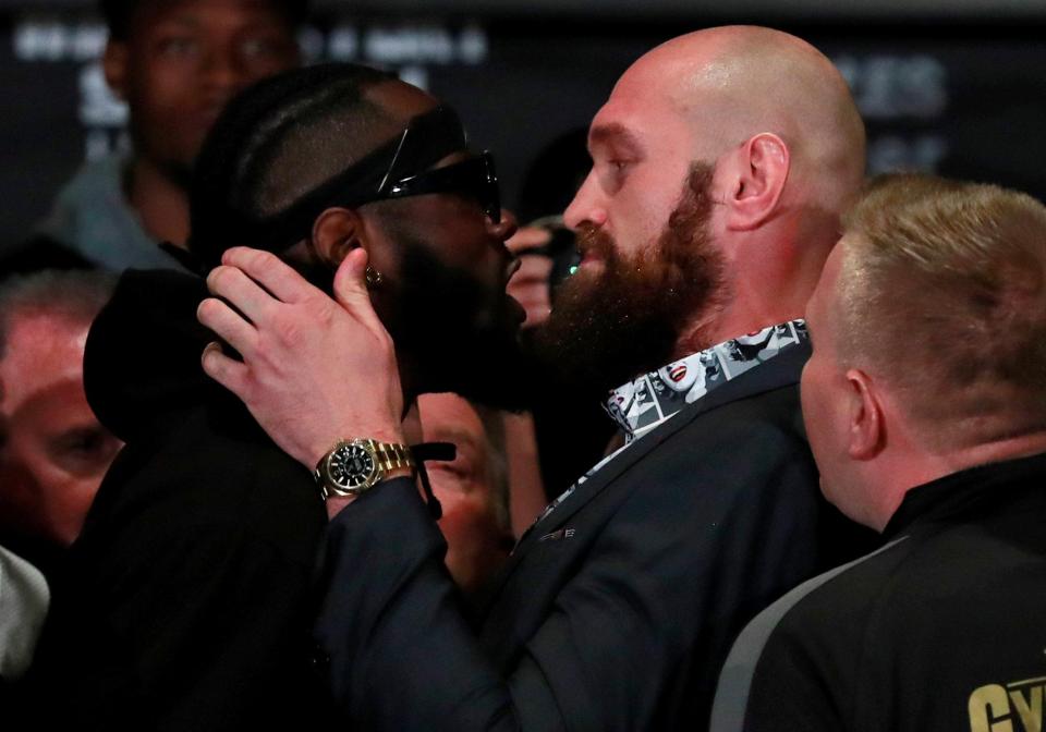  Tyson Fury and Deontay Wilder went toe-to-toe at the pre-fight conference