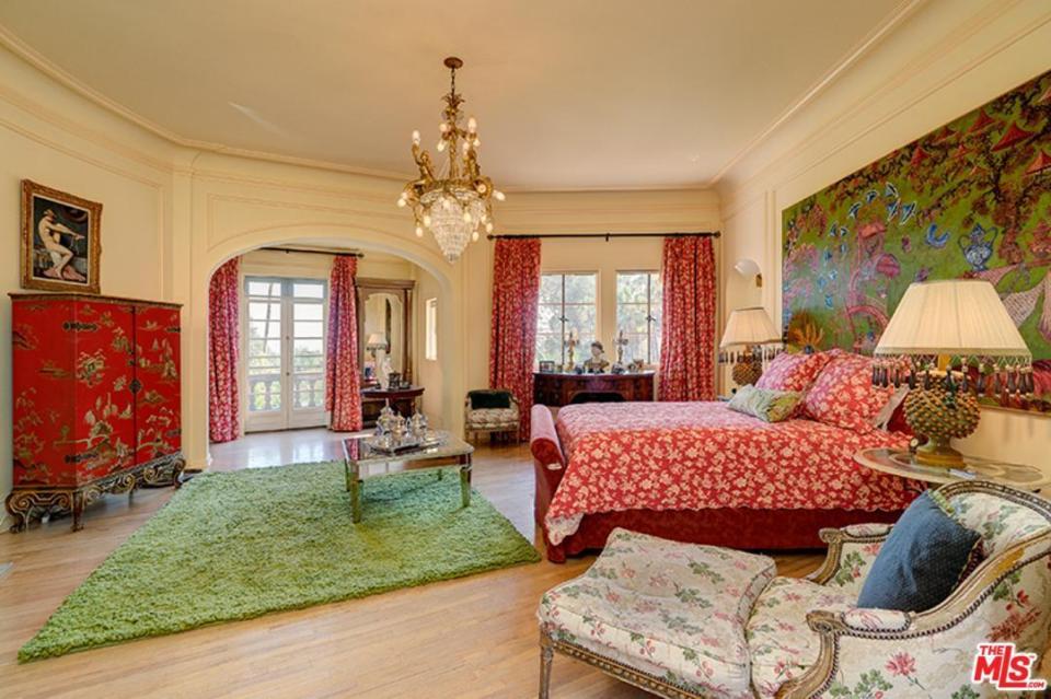  The master bedroom features his and her's bathrooms