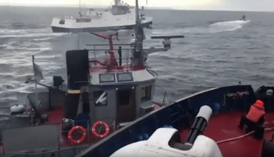  The moment the coastguard ship rams into the side of the helpless tug