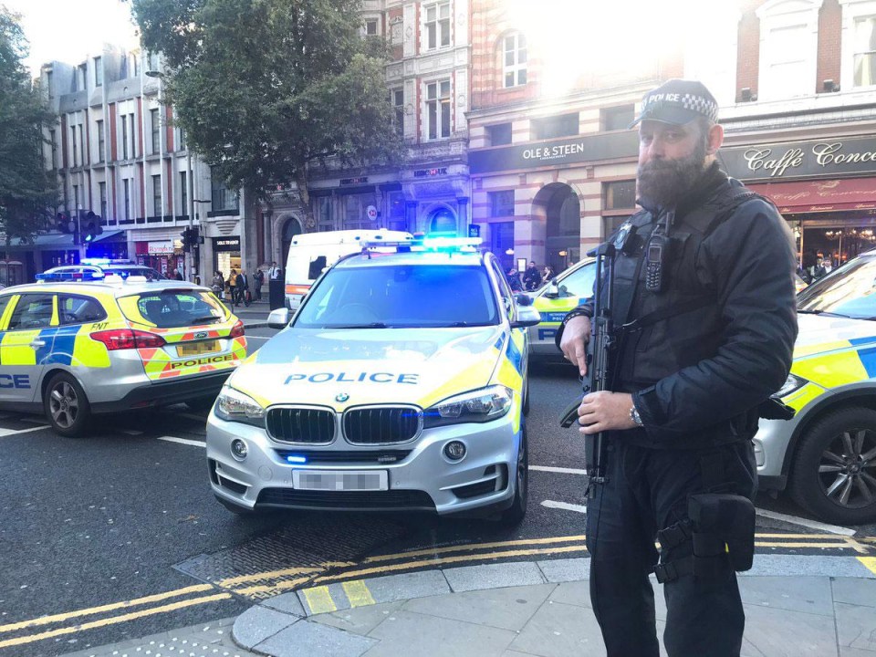 Armed police stormed the office block in Kensington, West London, fearing a terror attack was in progress