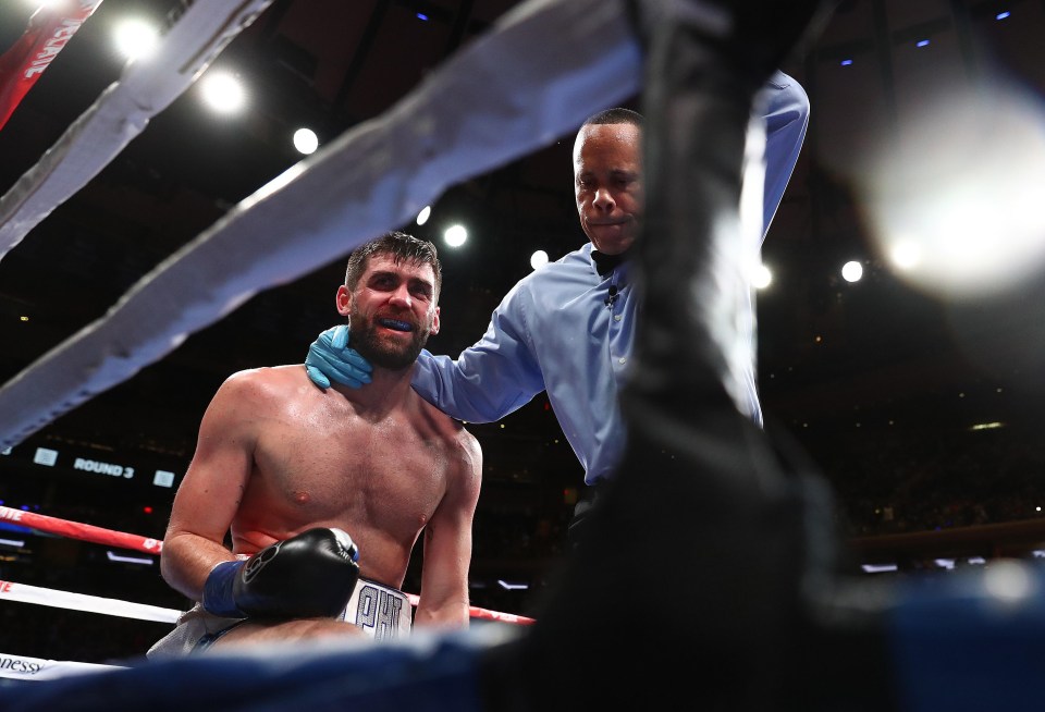 The referee helps Fielding back to his corner and a valiant but unsuccessful attempt in New York