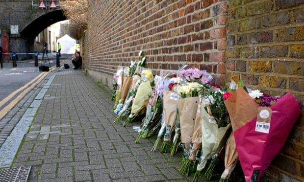  Flowers laid after the fatal stabbing of Israel Ogunsola, 18, in a London street in April this year