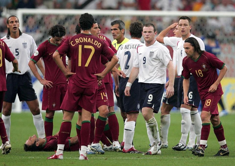  Wayne Rooney looks towards Portugal's Cristiano Ronaldo after being sent off during the quarter final match