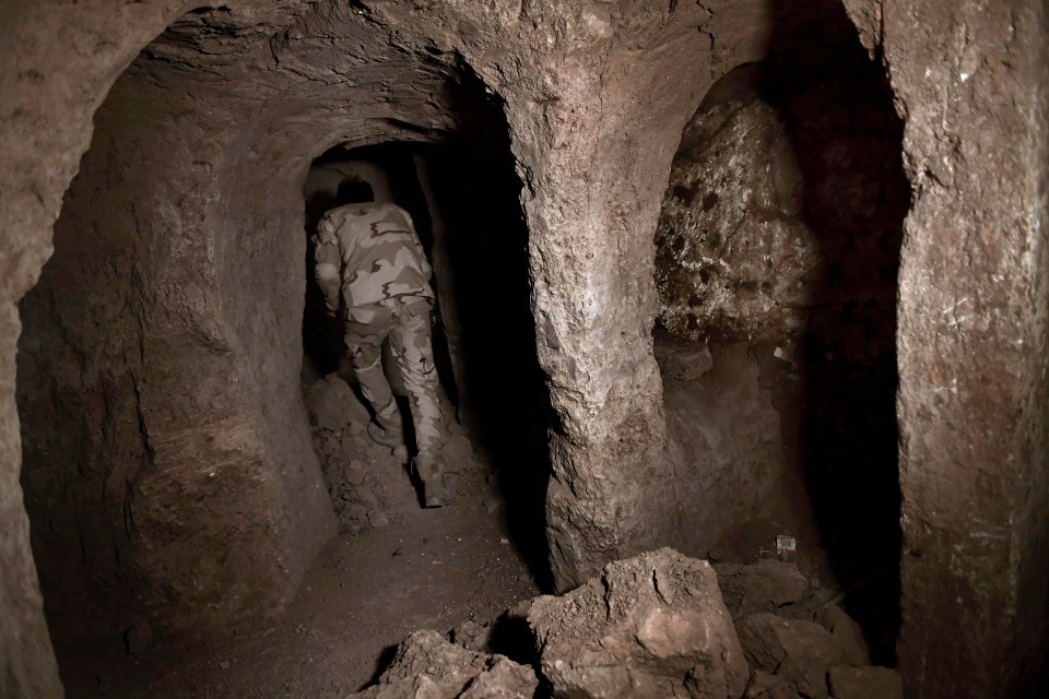 An Iraqi soldier in a tunnel in Mosul, used as a training centre by jihadists