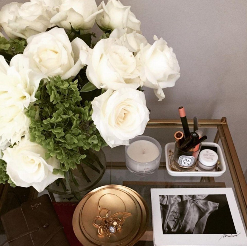 The former Suits actress covered every surface of her bedroom with fresh flowers and luxury candles