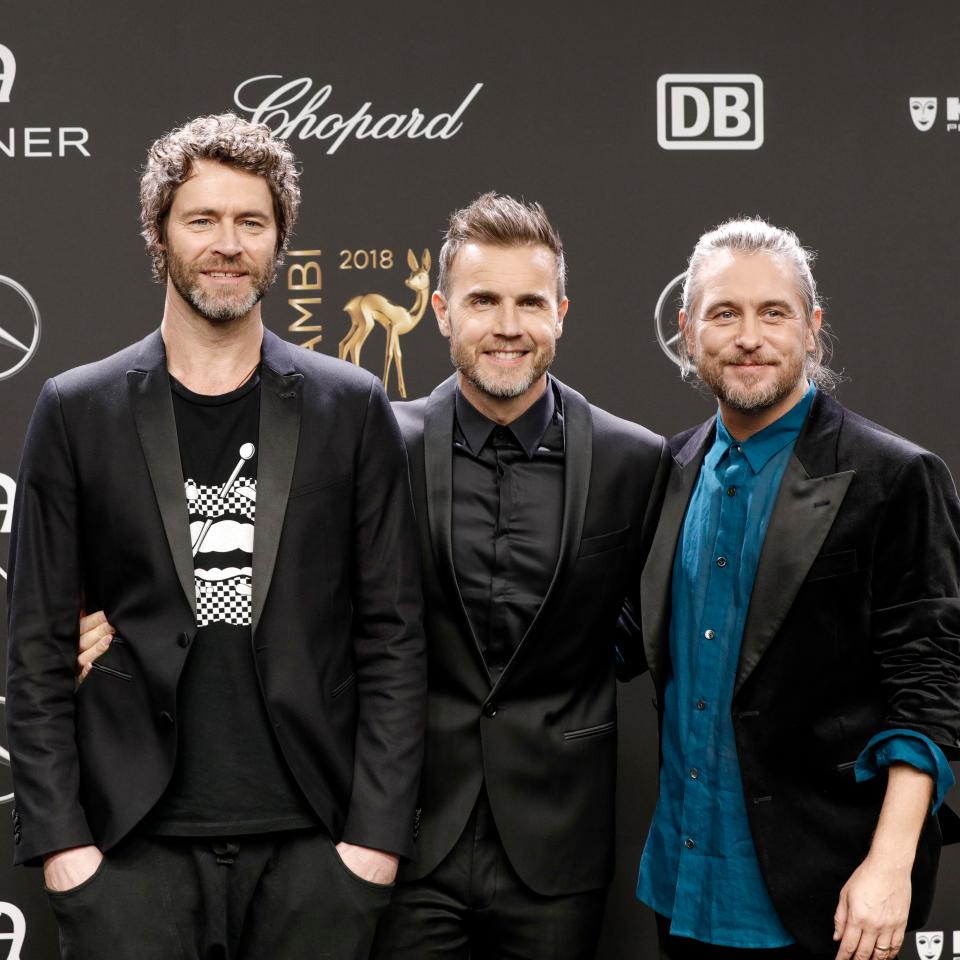  The band is now made up [from left] Howard Donald, Gary Barlow and Mark Owen