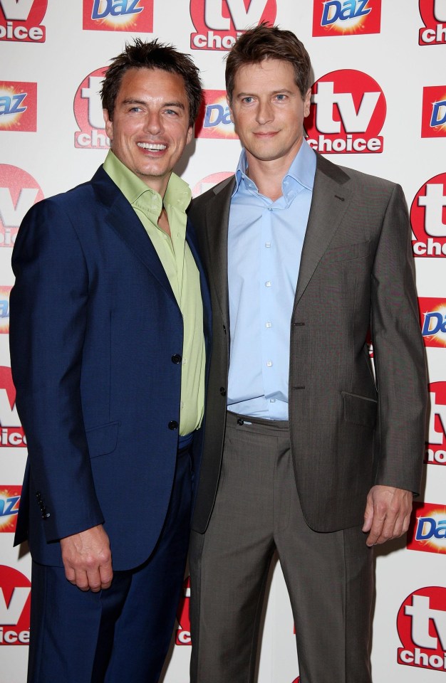 John Barrowman’s hunky hubbie Scott has also flown out