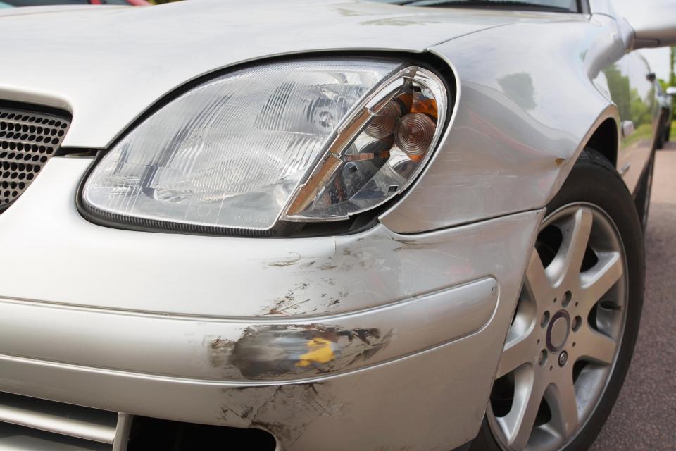 Take pictures of all the damage caused to both cars - close-ups and wide shots that include the number plate