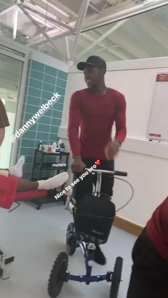  Danny Welbeck is using a three-wheeled mini bike to help him get around