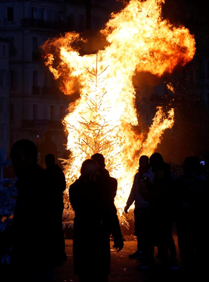  A Christmas tree was set on fire in the Old Port area of Marseille on December 1