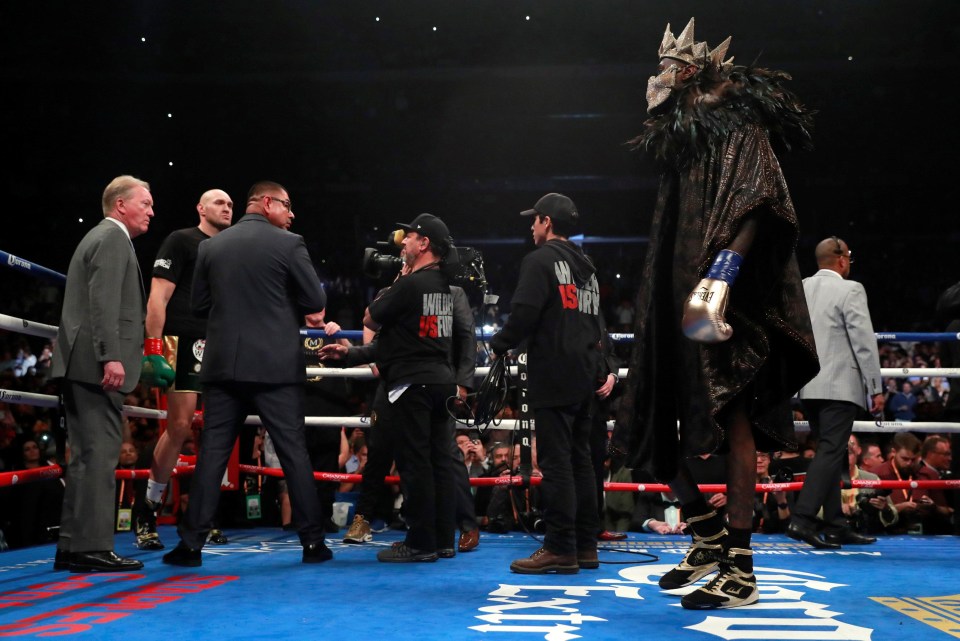 Tyson Fury and Deontay Wilder could not have dressed any more different as they arrived in the ring