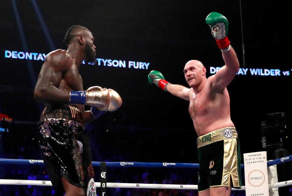  Fury raised his arms to taunt Wilder