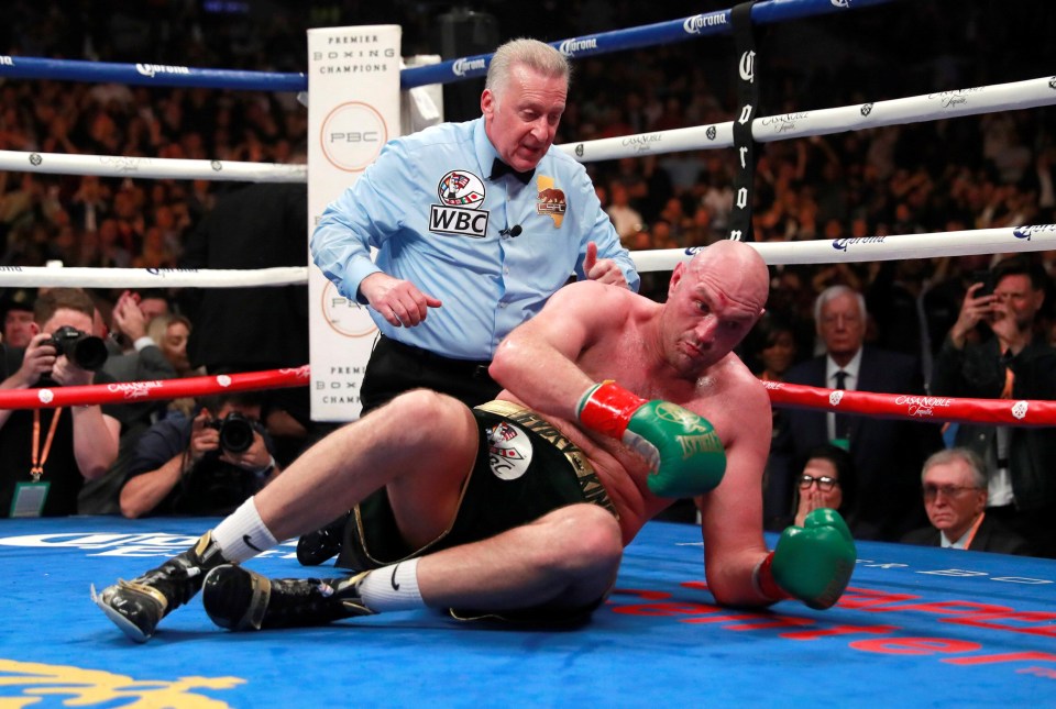 Tyson Fury was knocked to the ground twice to miss out on beating Deontay Wilder