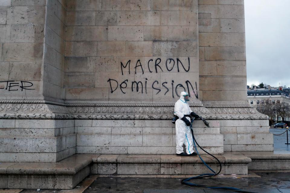  Clean-up work began today. Graffiti on the Arc de Triomphe called for President Macron to resign