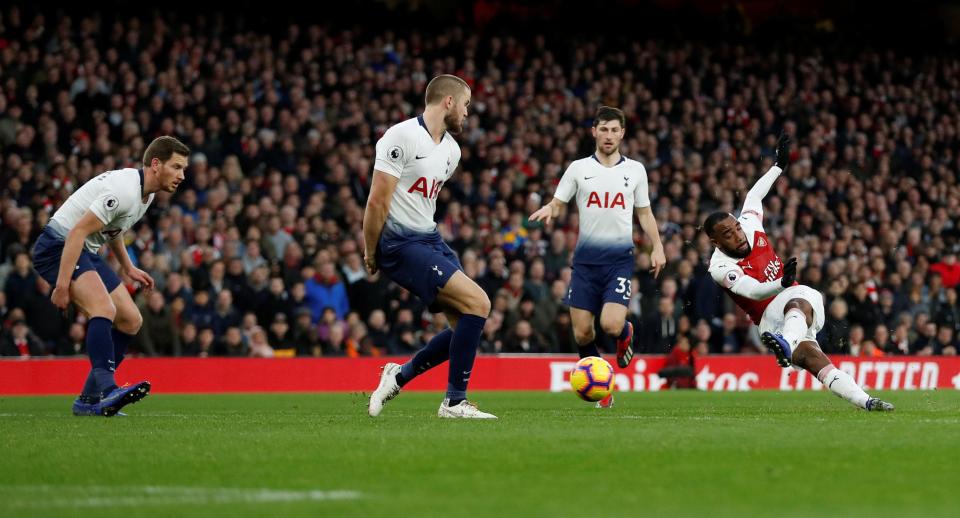  Alexandre Lacazette's strike took a deflection before it curled into the corner of the cut