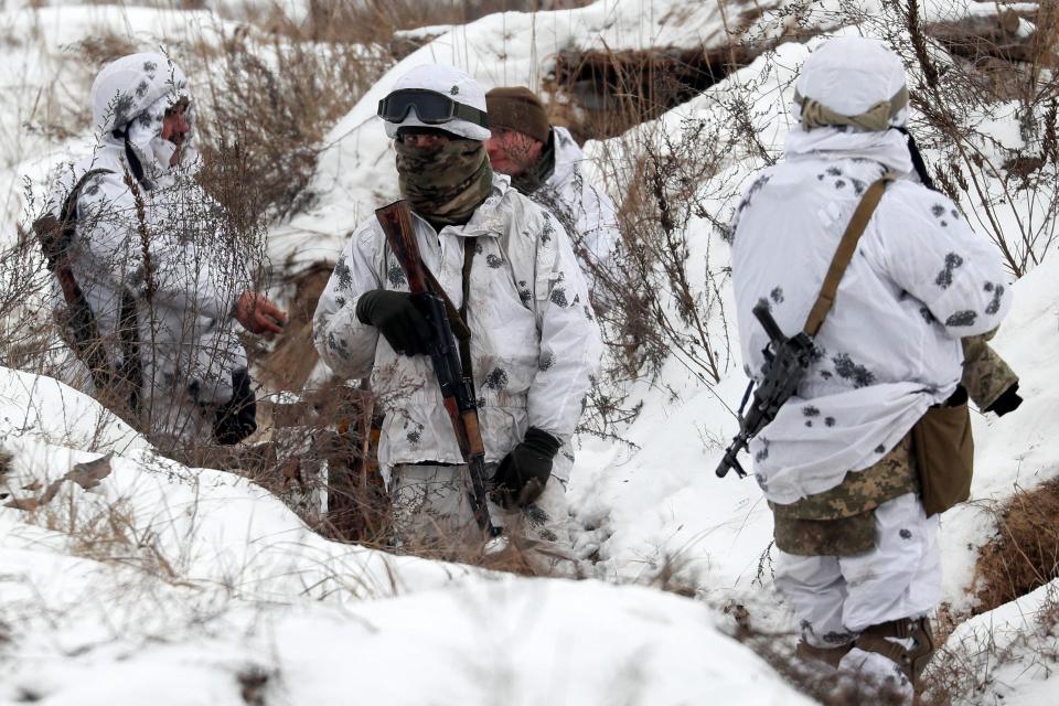 Ukrainian soldiers are seen as they take part in military exercises in the Ukrainian Ground Forces training centre near Honcharivske in Chernihiv region