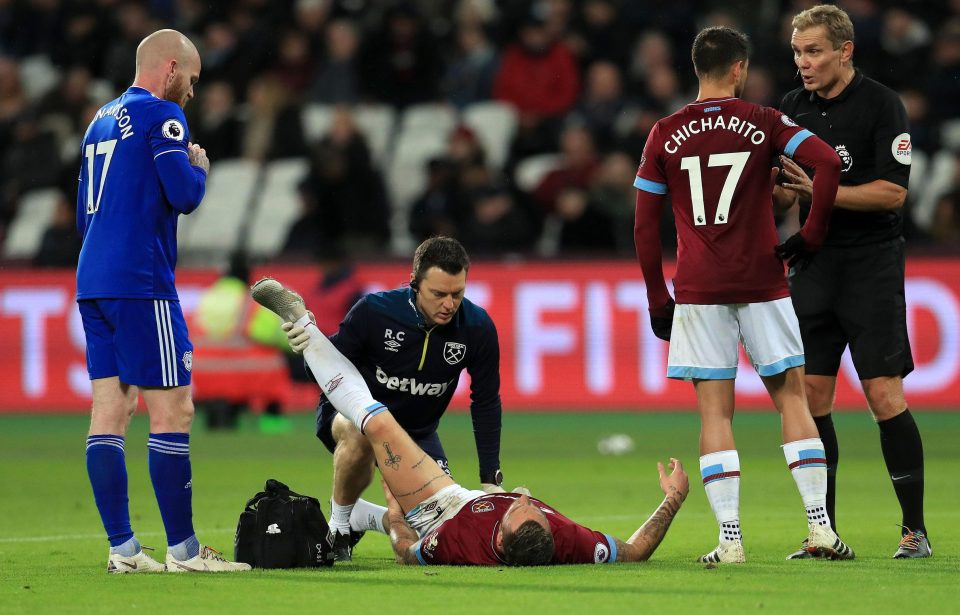 Striker Marko Arnautovic gets treatment but had to go off with more hamstring woe as West Ham took on Cardiff tonight