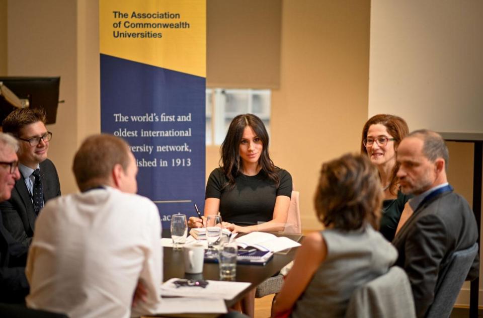  She took notes at the head of a table as they discussed gender equality and climate change