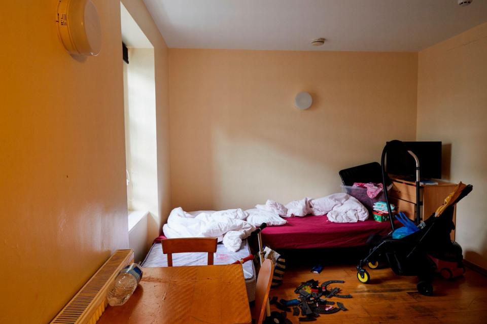  Edward, four, and his mum Genevieve share a room in a hostel