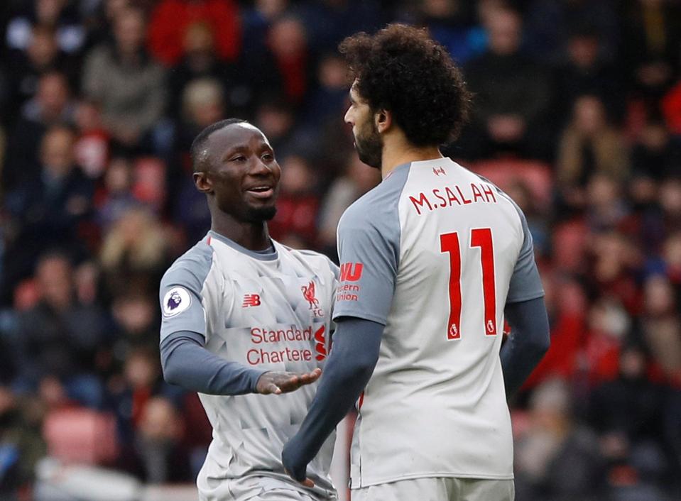  Keita celebrates with Mo Salah after the Egyptian gives Liverpool the lead