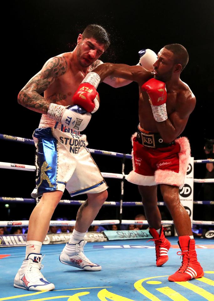 Michael Zerafa, left, battles with Kell Brook at the Final Eliminator WBA Super-Welterweight Championship