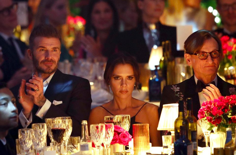  A sullen Victoria Beckham with husband David at the awards