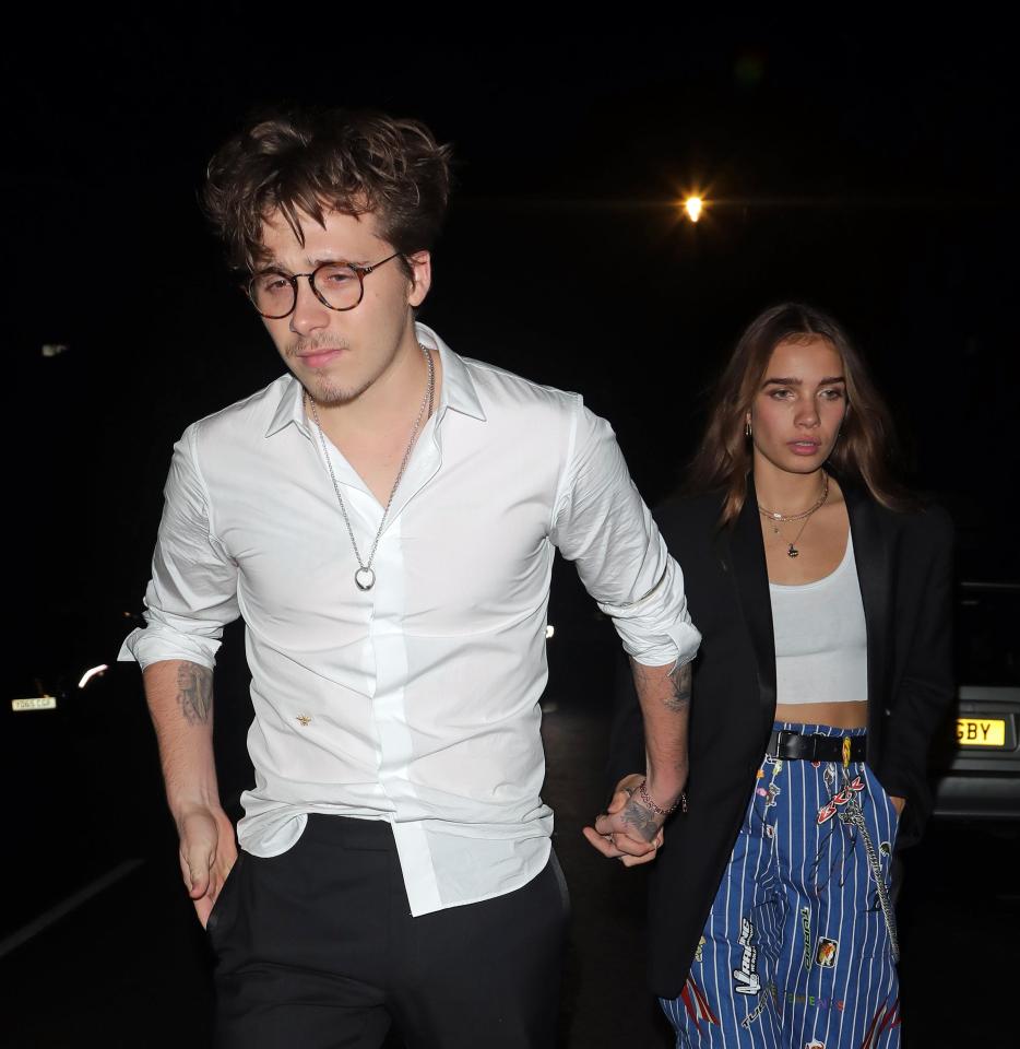  Their son Brooklyn Beckham took girlfriend Hanna Cross to the bash