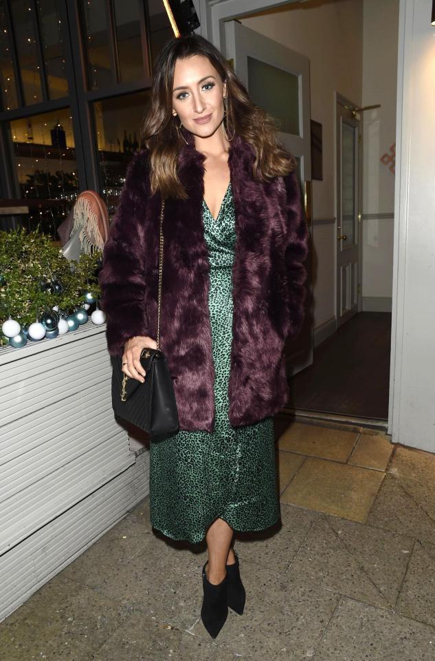  Fitness fan Catherine finished her look with a purple faux fur coat and an Yves Saint Laurent bag