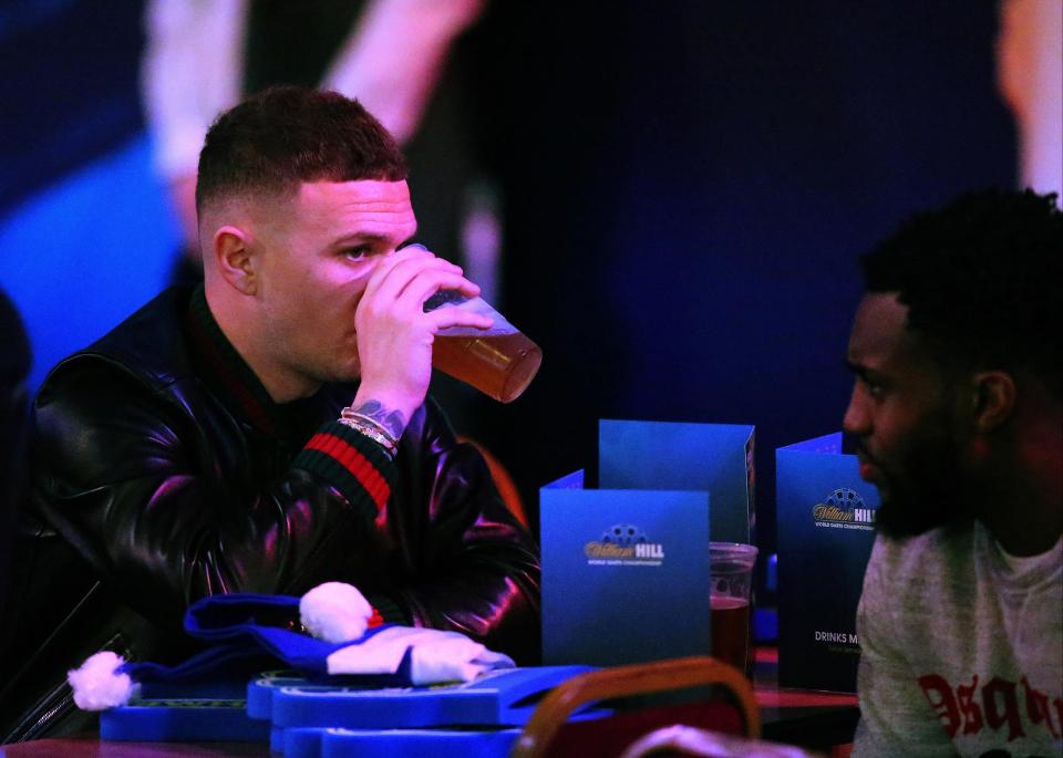  Kieran Trippier enjoyed a pint of beer at the World Darts Championship