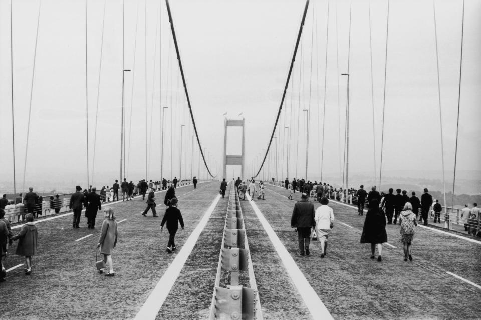  In 1966, the first crowds cross the new Severn Bridge between England and Wales, after its official opening