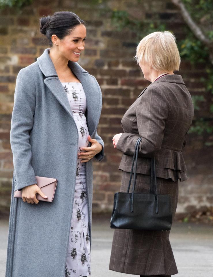 Meghan, pictured earlier today on a visit to the Royal Variety residential nursing and care home Brinsworth House in Twickenham