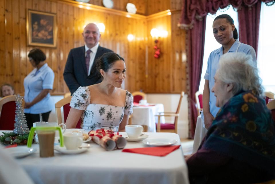 Meghan spoke to residents as they listened to Christmas carols