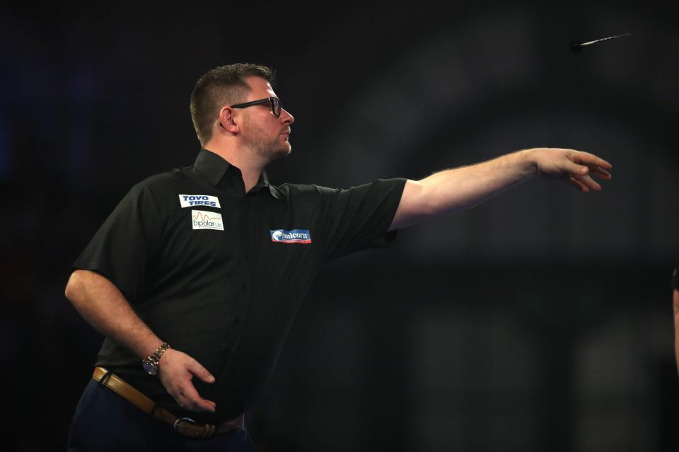 James Wade beat Seigo Asada 3-2 in a tight second-round match