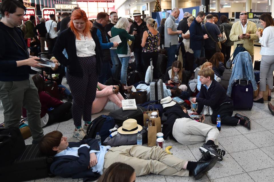  Stranded Gatwick passengers hit by cancelled flights and hours of delays try to sleep on the airport floor