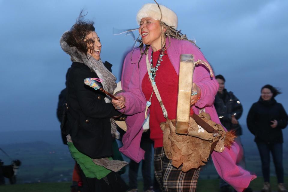  Two women celebrate the dawning of the Winter Solstice