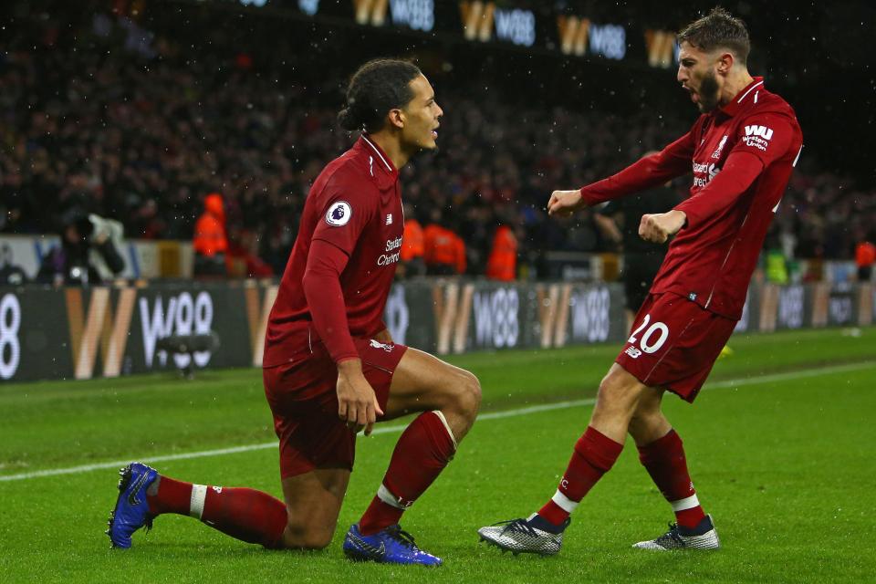  Adam Lallana came on as his replacement and was quick to join in the celebrations with Virgil Van Dijk