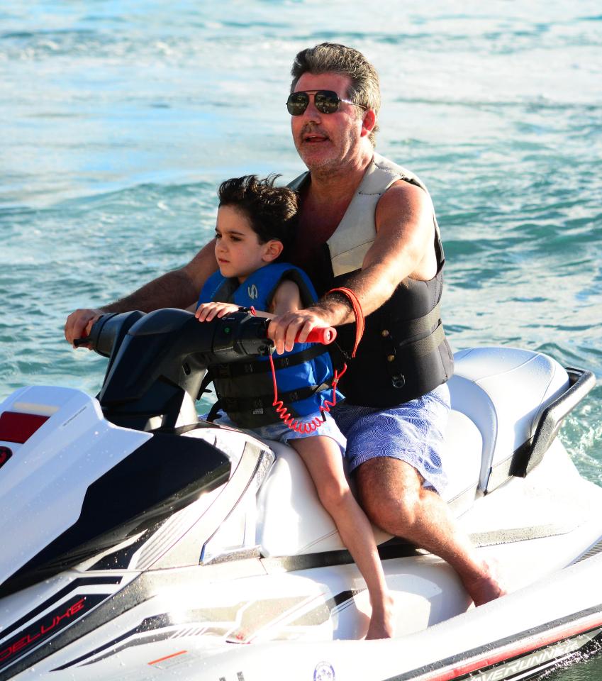  Simon Cowell was every inch the doting dad as he joined his son Eric to go jet skiing