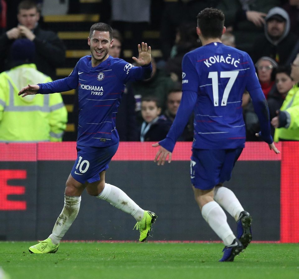  Hazard celebrates one of two goals against Watford that moved him to 101 strikes for the Blues